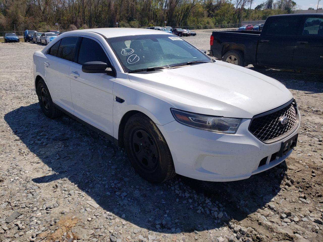 FORD TAURUS POL 2014 with VIN 1FAHP2L81EG159531 - Photo from auction