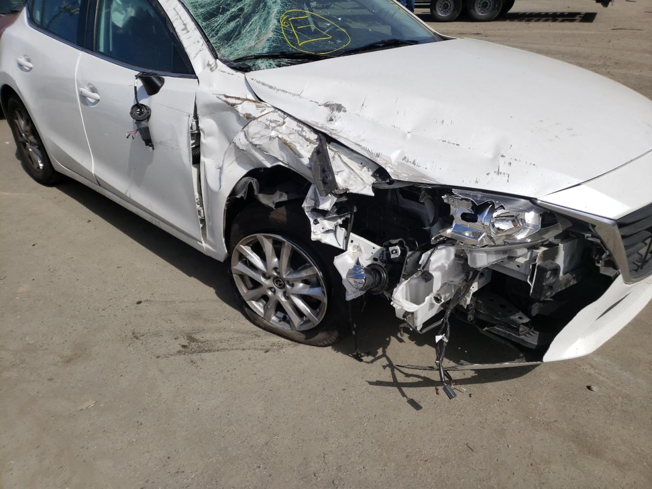 Photo 9 from auction – 2015 MAZDA 3 TOURING with VIN 3MZBM1L78FM218959