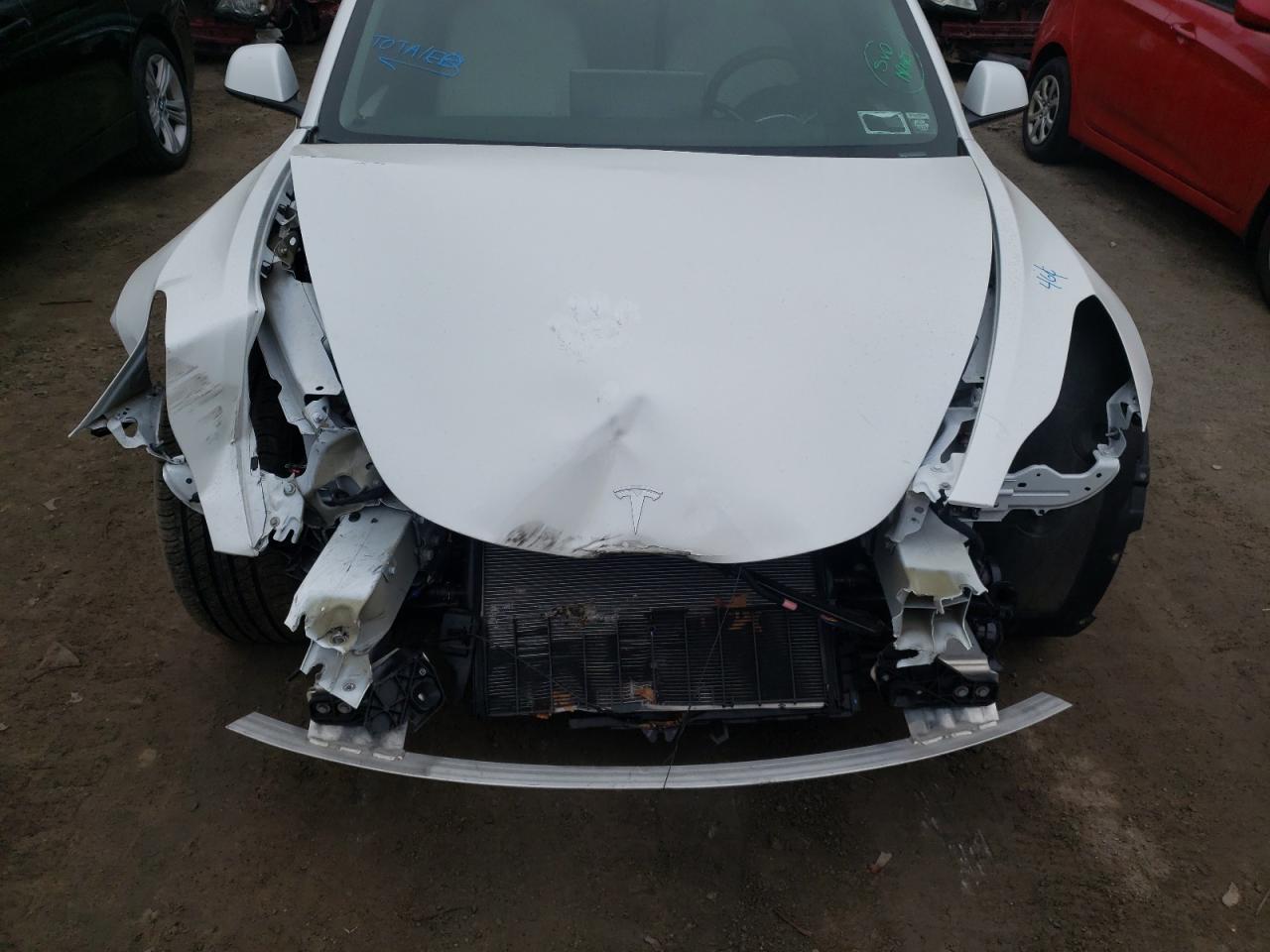 Photo 9 from auction – 2021 TESLA MODEL 3 with VIN 5YJ3E1EB7MF060489