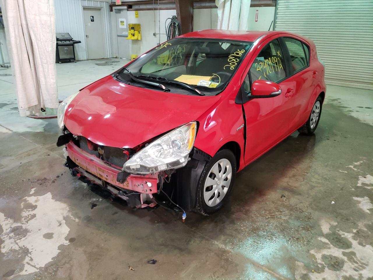 Photo 2 from auction – 2014 TOYOTA PRIUS C with VIN JTDKDTB36E1559785