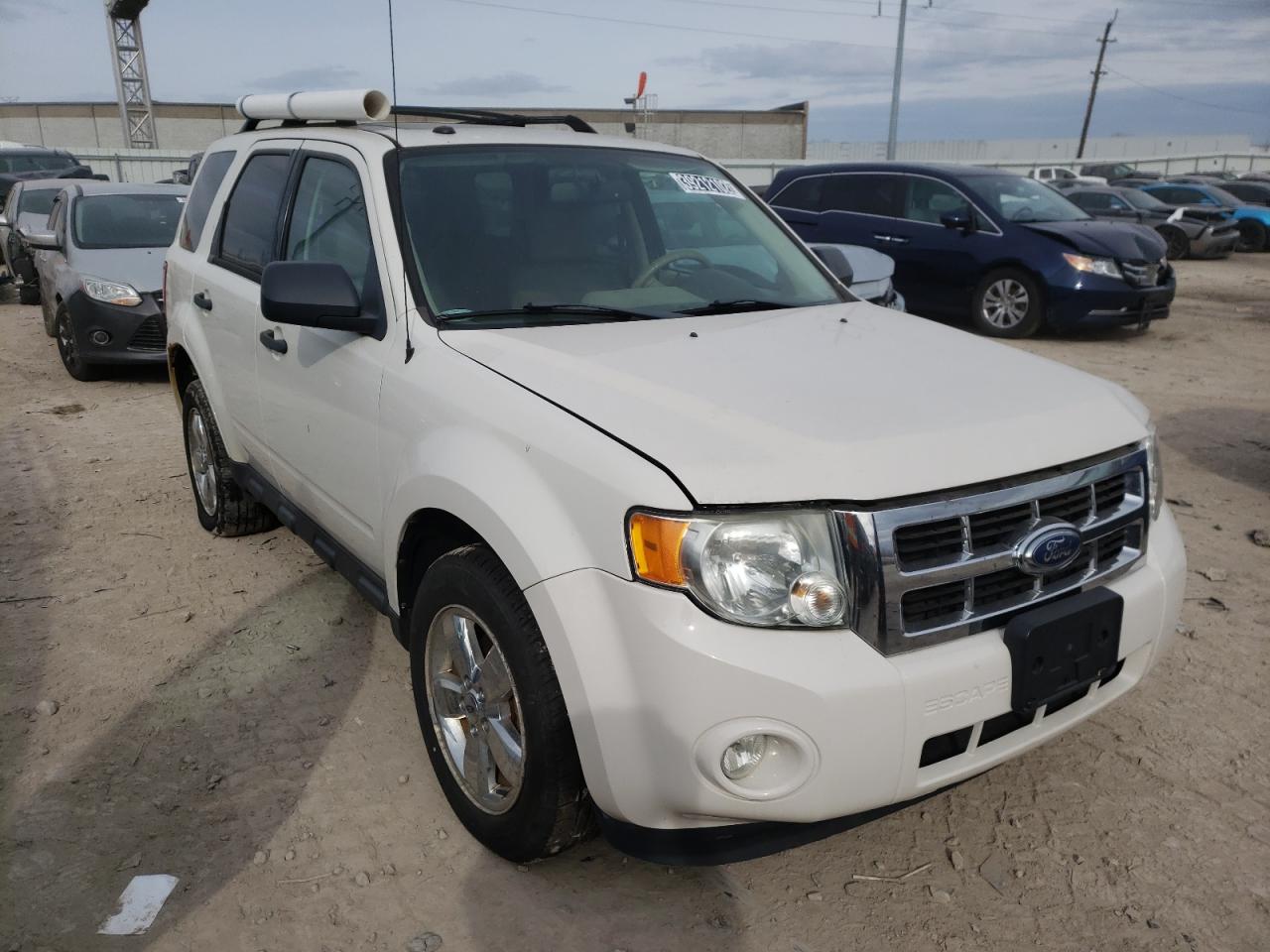 FORD ESCAPE XLT 2011 with VIN 1FMCU9DG1BKB21443 - Photo from auction