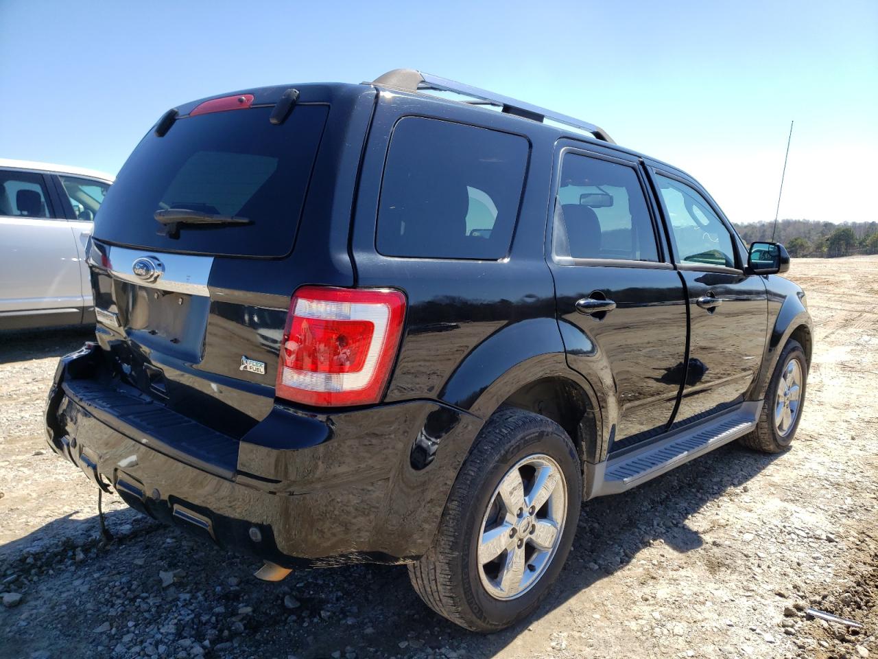 Photo 4 from auction – 2010 FORD ESCAPE LIM with VIN 1FMCU0EG9AKC75715