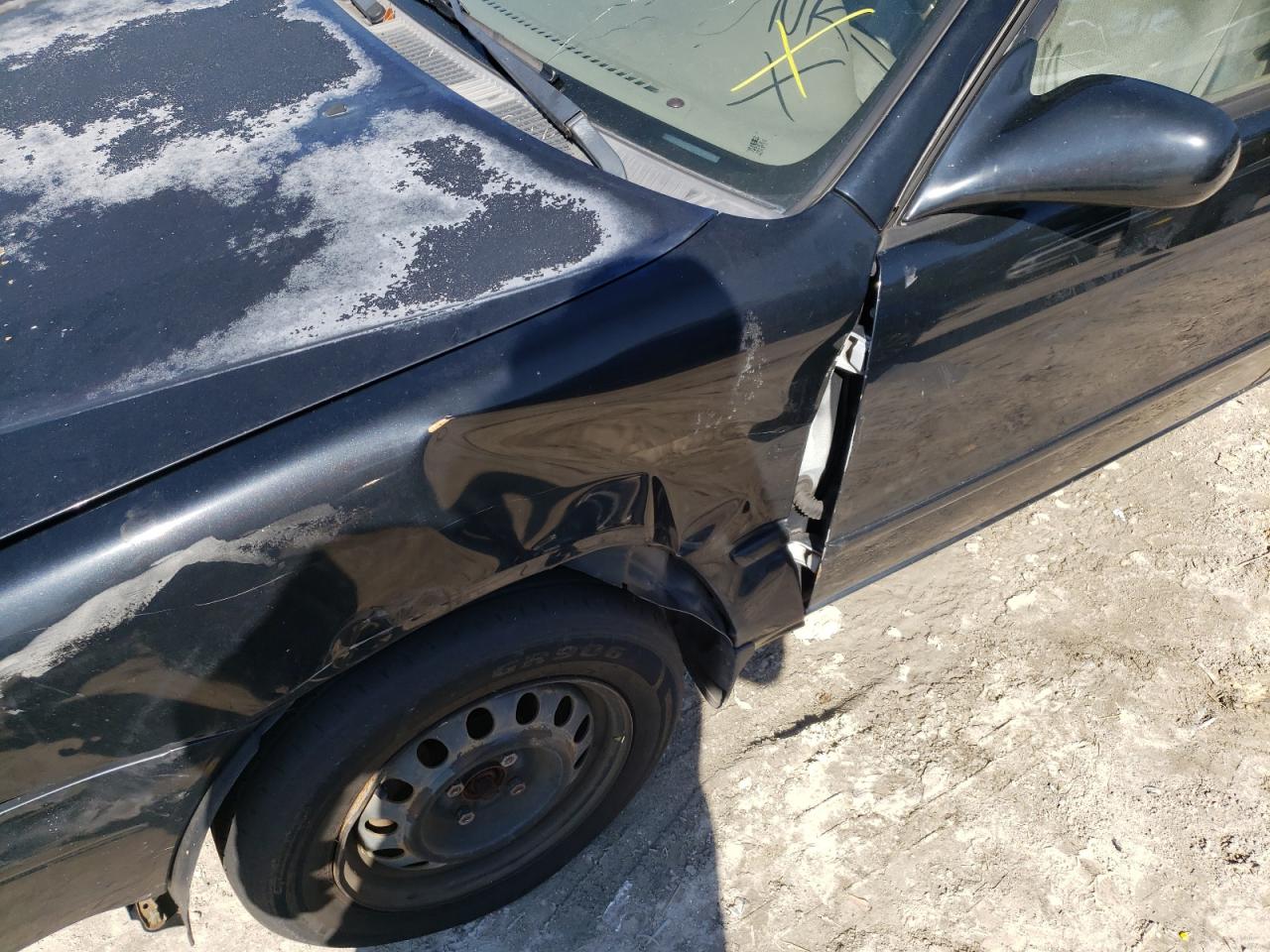 Photo 9 from auction – 2001 TOYOTA COROLLA with VIN 2T1BR12E11C442502