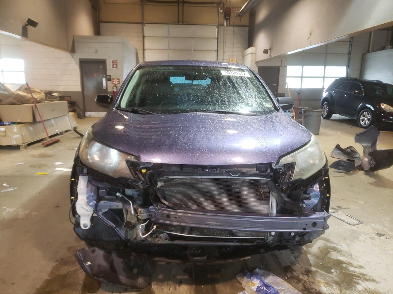 Photo 9 from auction – 2014 HONDA CR-V LX with VIN 2HKRM3H30EH519331