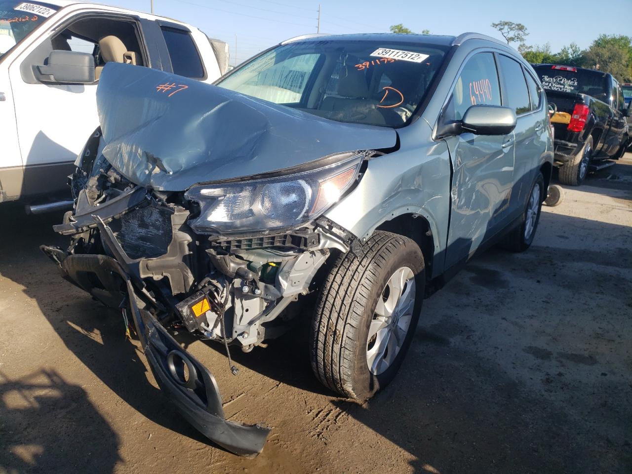 Photo 2 from auction – 2012 HONDA CR-V EXL with VIN JHLRM4H79CC010665