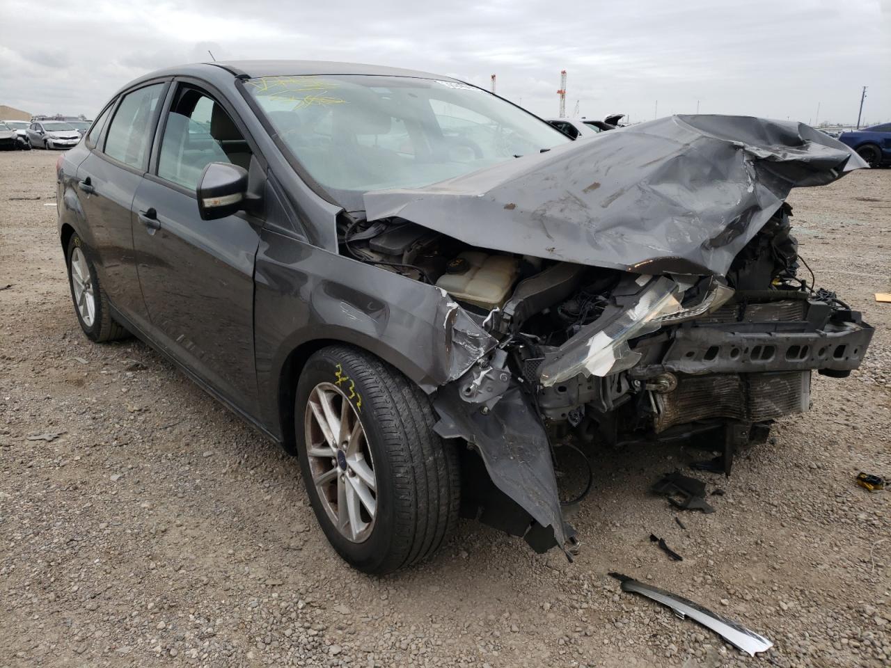 FORD FOCUS SE 2015 with VIN 1FADP3F2XFL297864 - Photo from auction