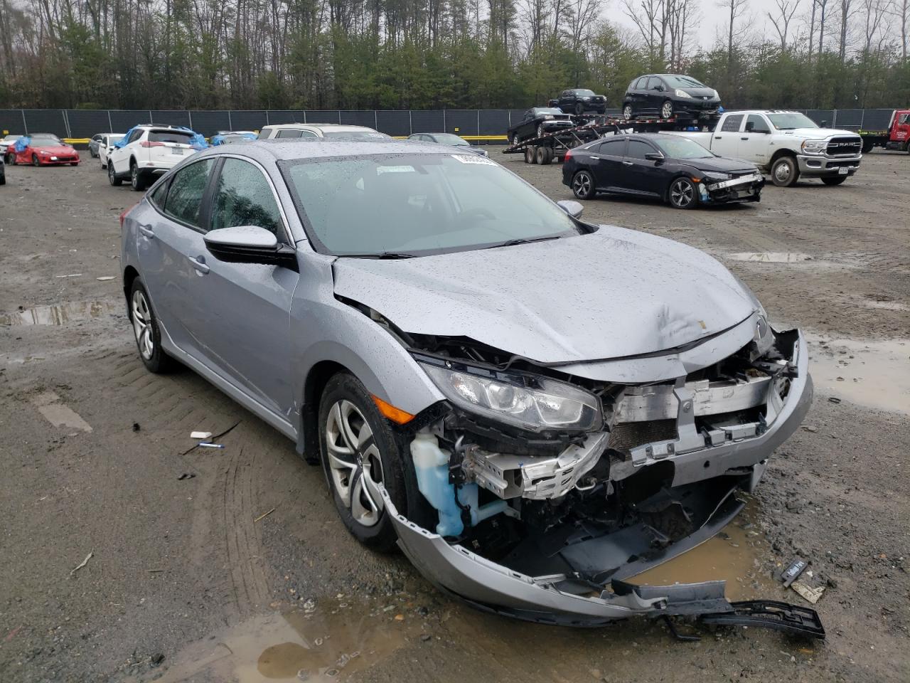HONDA CIVIC LX 2018 with VIN 2HGFC2F59JH562882 - Photo from auction