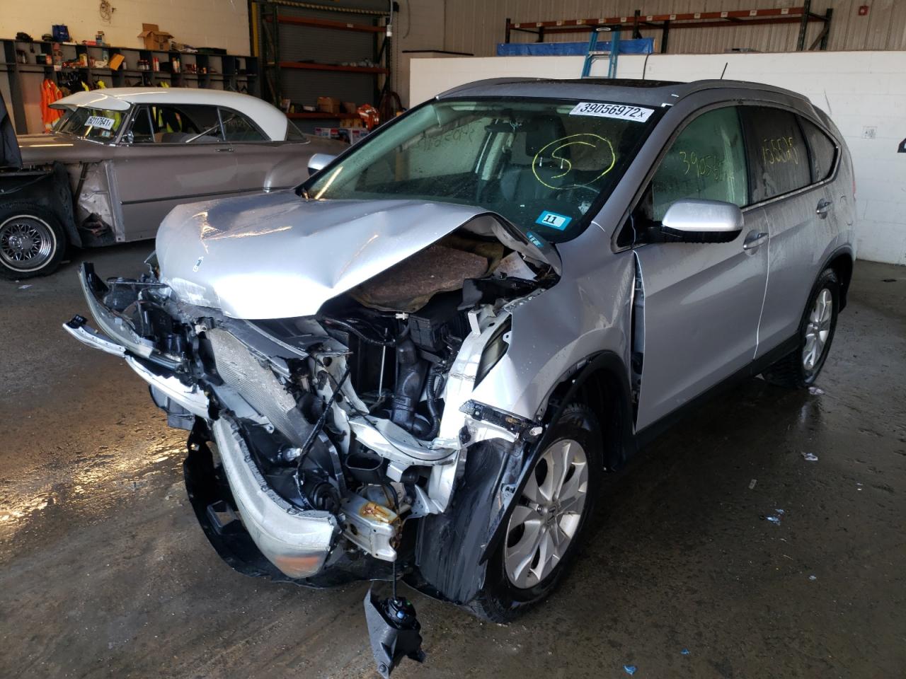 Photo 2 from auction – 2012 HONDA CR-V EXL with VIN 2HKRM4H74CH601472