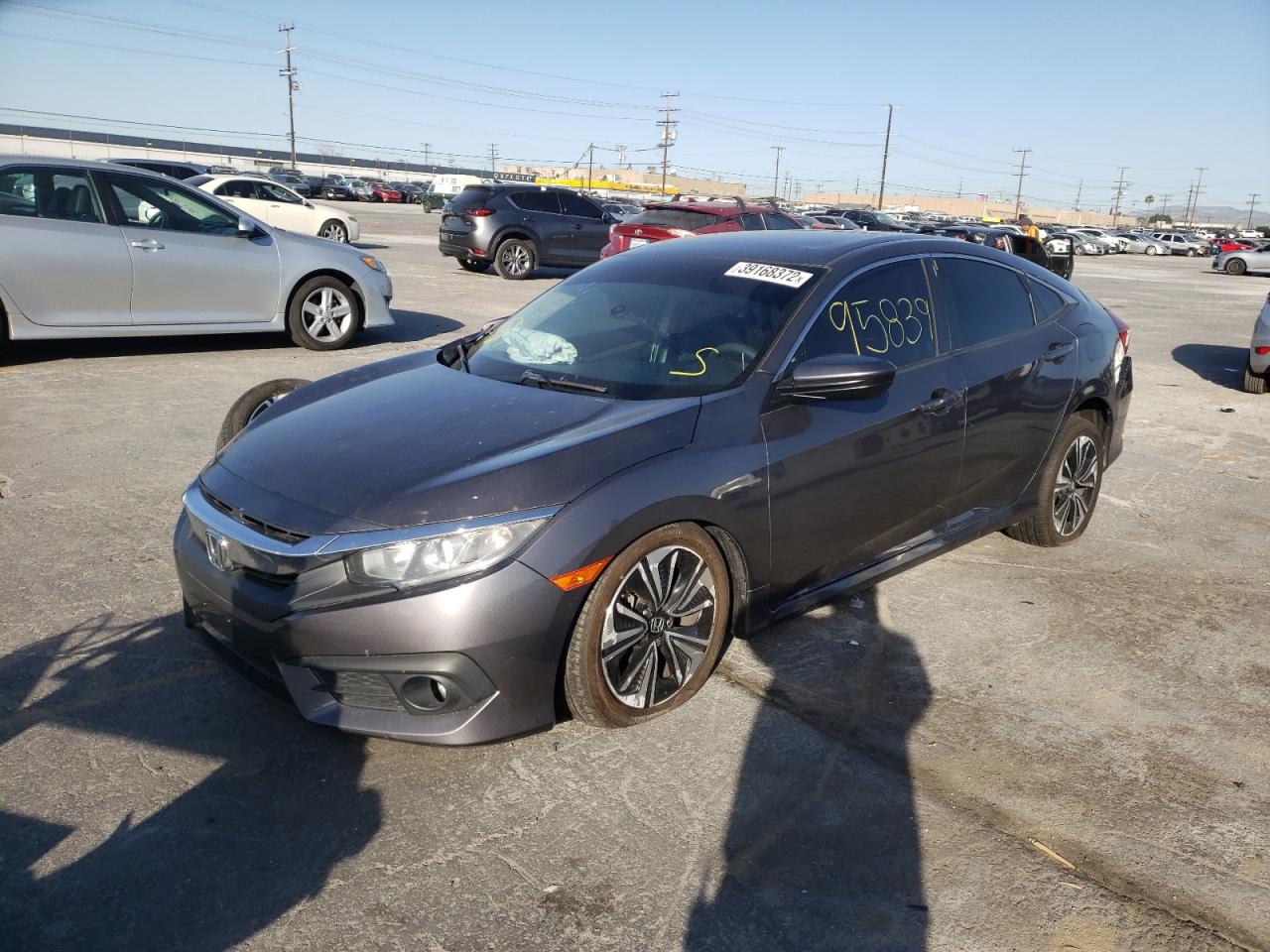 Photo 2 from auction – 2017 HONDA CIVIC EX with VIN 2HGFC1F33HH643962