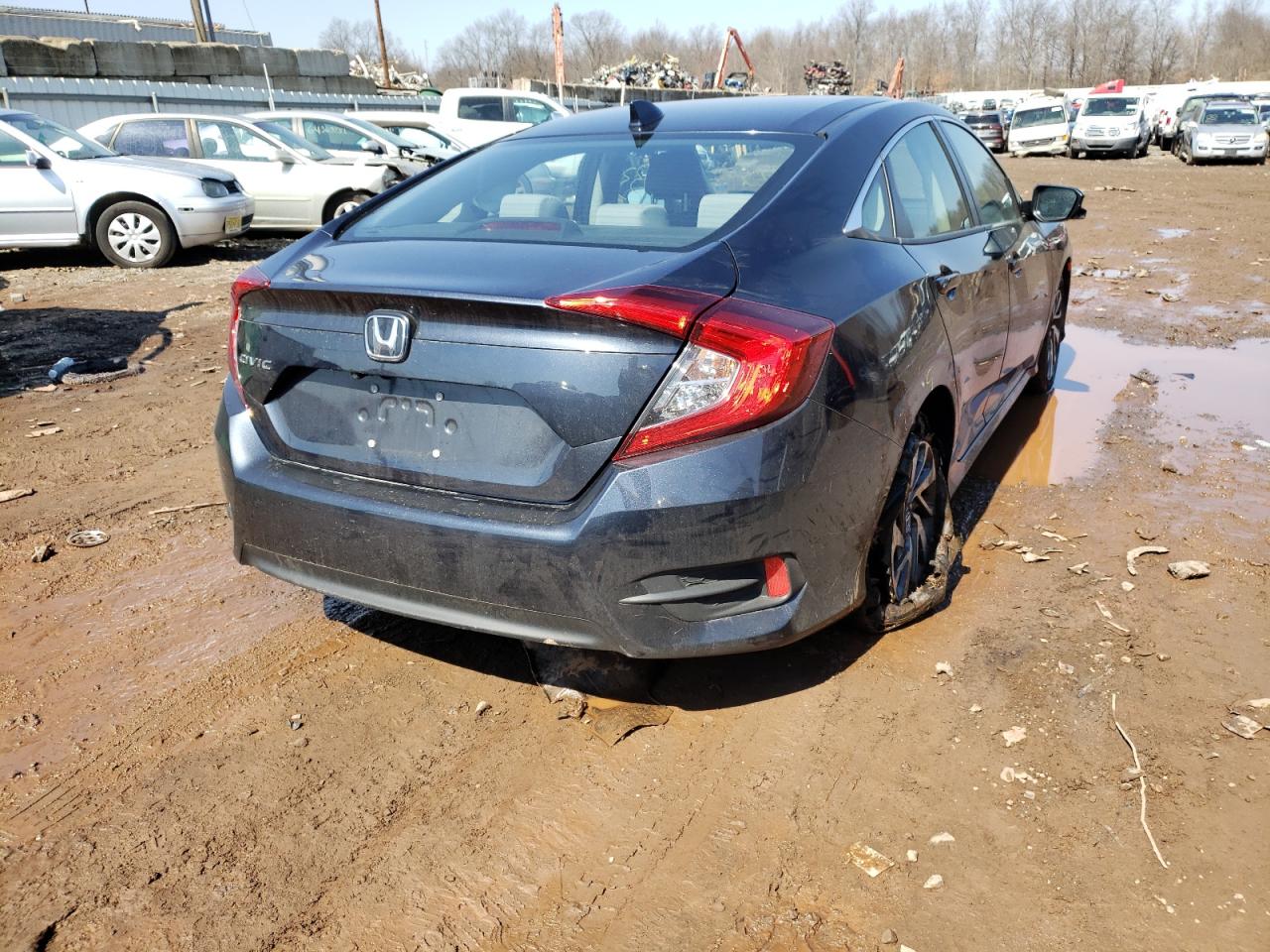 Photo 4 from auction – 2018 HONDA CIVIC EX with VIN 2HGFC2F71JH548668