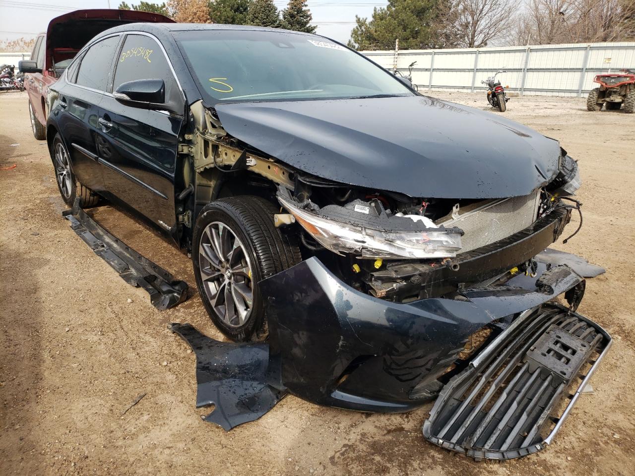 TOYOTA AVALON HYB 2018 with VIN 4T1BD1EB8JU063513 - Photo from auction