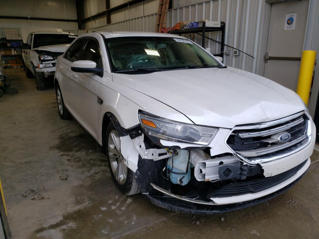 FORD TAURUS SEL 2013 with VIN 1FAHP2E81DG122376 - Photo from auction