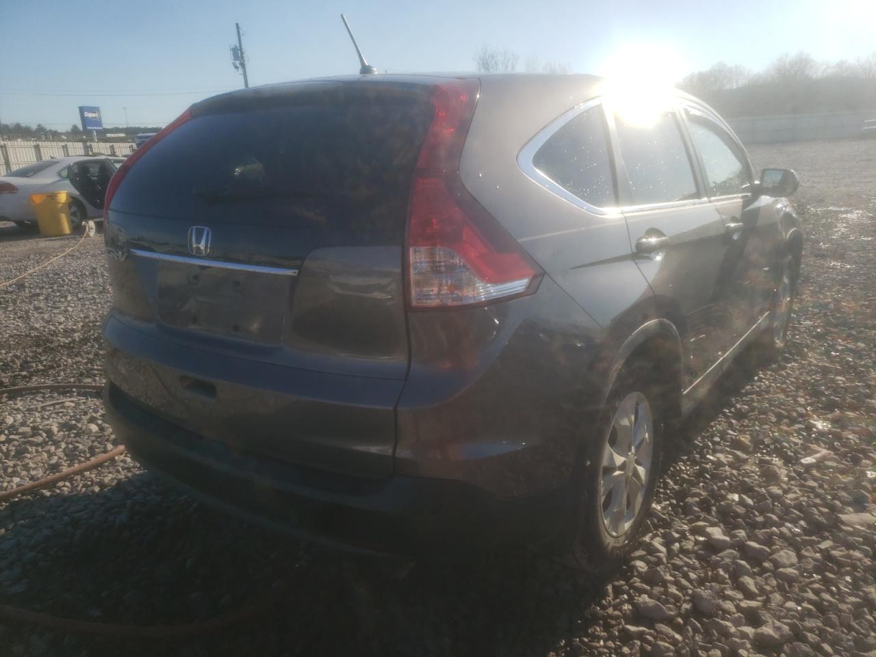 Photo 4 from auction – 2012 HONDA CR-V EX with VIN 3CZRM3H59CG702552