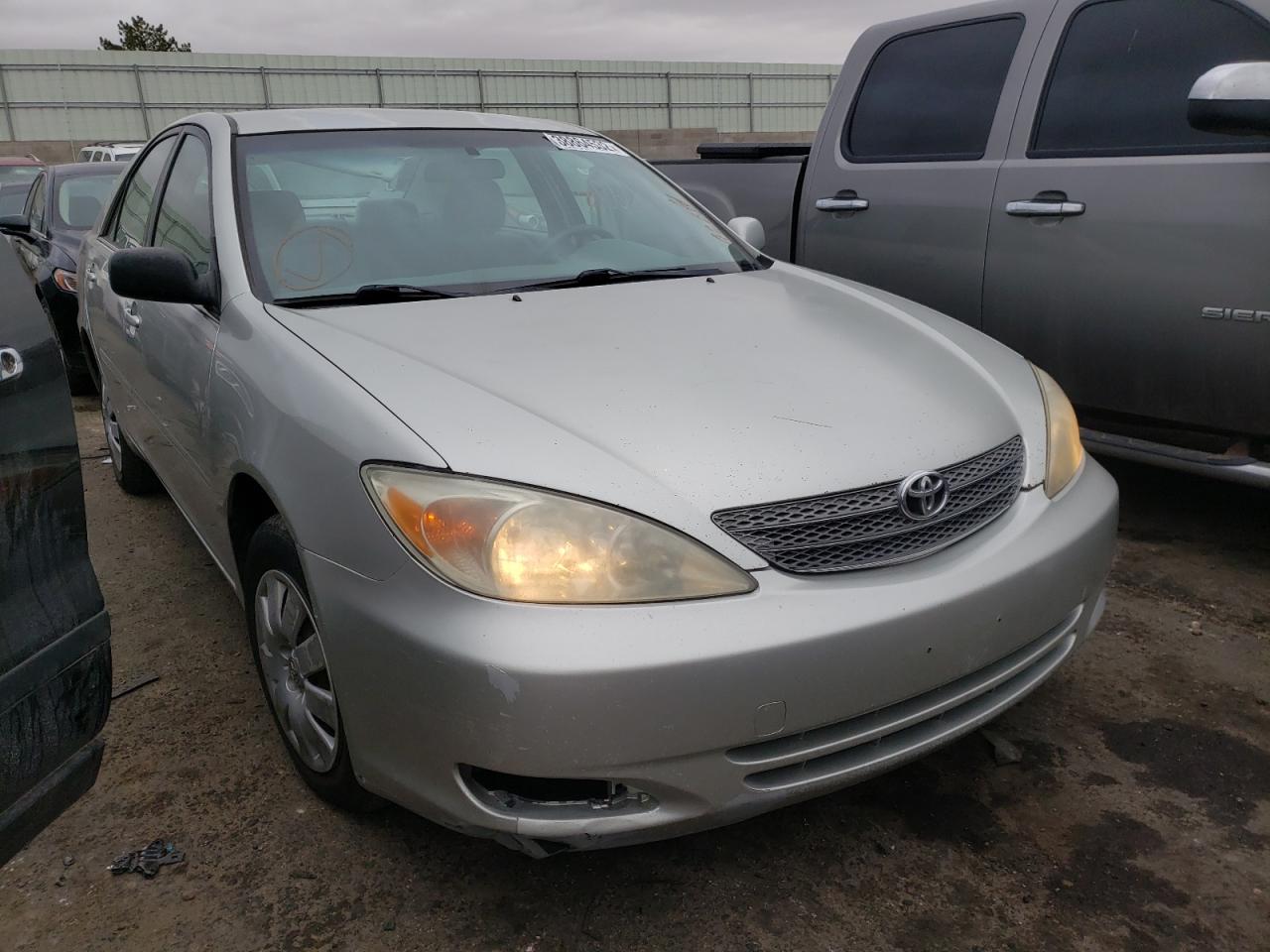 TOYOTA CAMRY LE 2002 with VIN JTDBE30K320016631 - Photo from auction