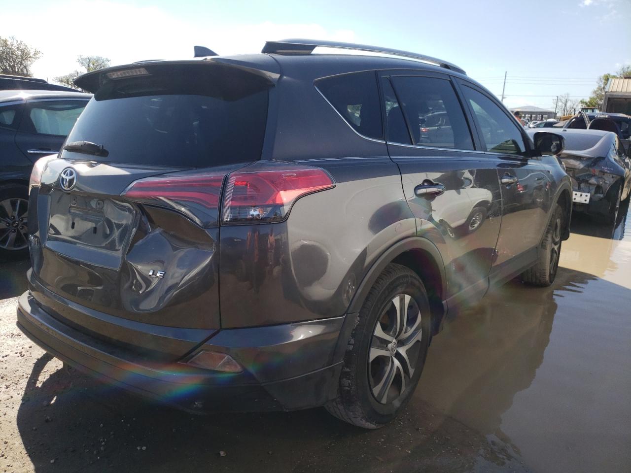 Photo 4 from auction – 2017 TOYOTA RAV4 LE with VIN JTMZFREV2HJ138031