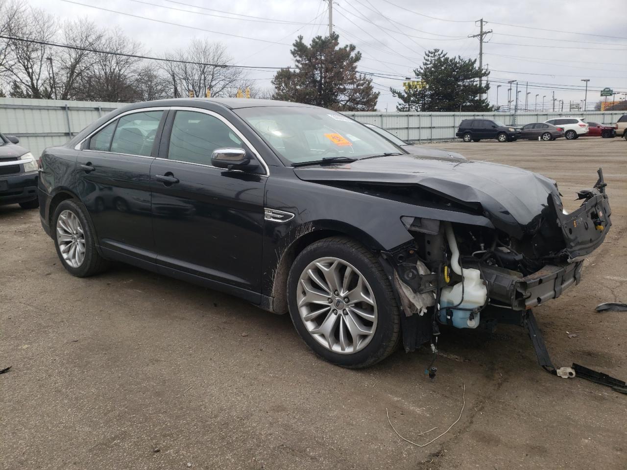 FORD TAURUS LIM 2013 with VIN 1FAHP2F85DG229980 - Photo from auction