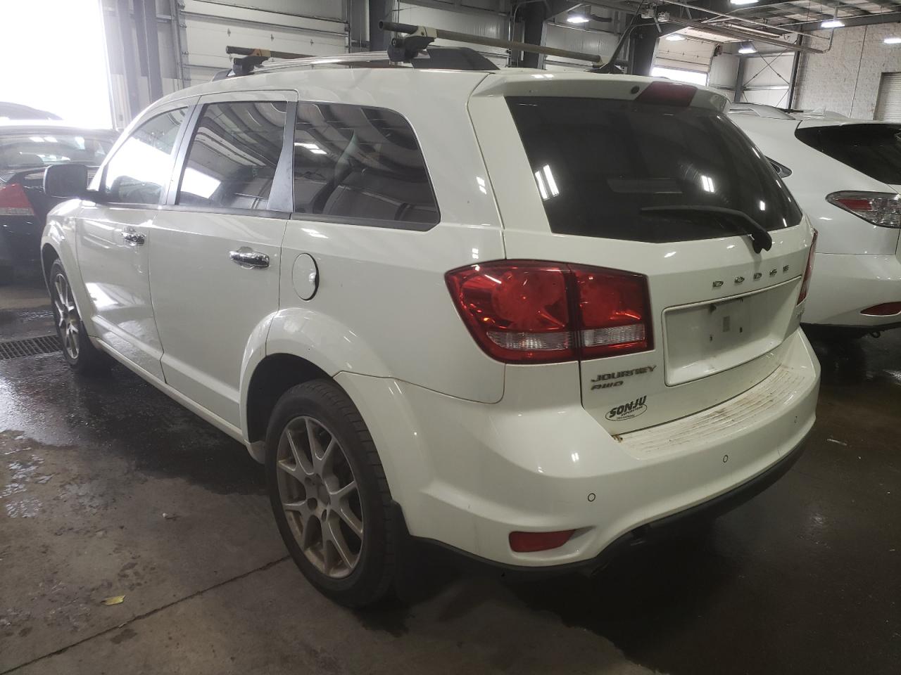 Photo 3 from auction – 2011 DODGE JOURNEY CR with VIN 3D4PH3FG0BT537604