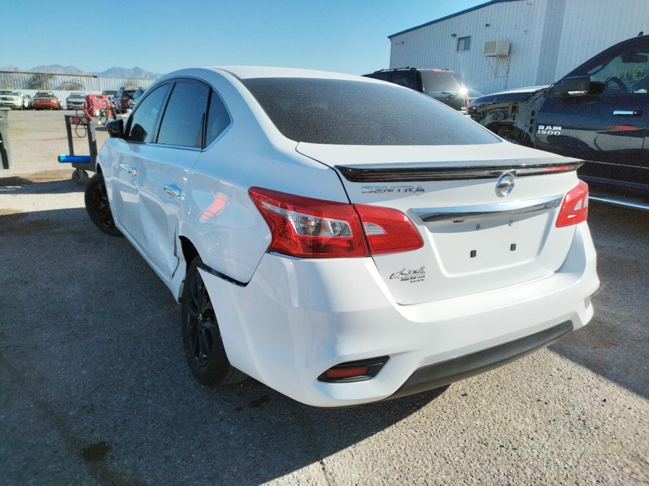 Photo 3 from auction – 2018 NISSAN SENTRA S with VIN 3N1AB7AP0JY276384