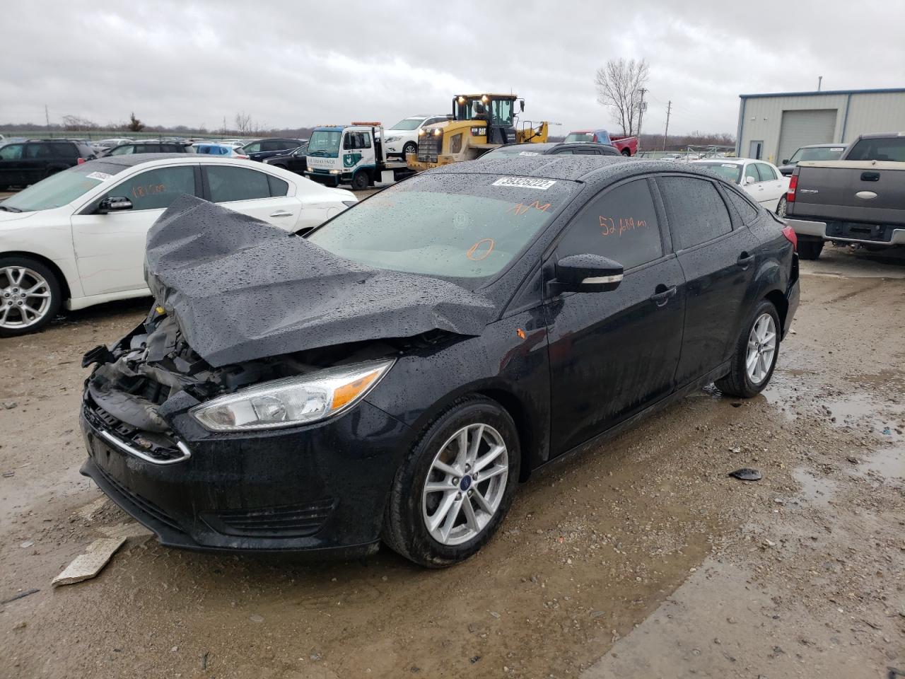 Photo 2 from auction – 2017 FORD FOCUS SE with VIN 1FADP3F22HL328771
