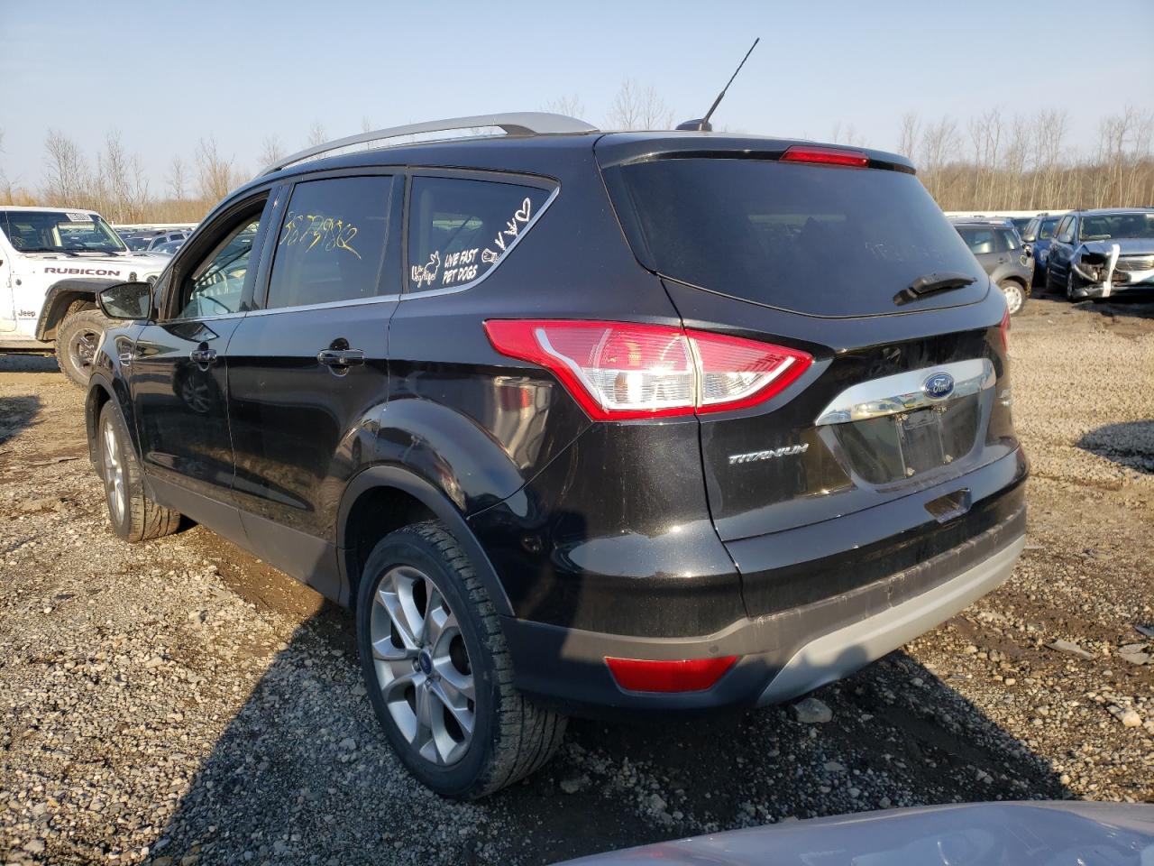 Photo 3 from auction – 2015 FORD ESCAPE TIT with VIN 1FMCU9J99FUA39010