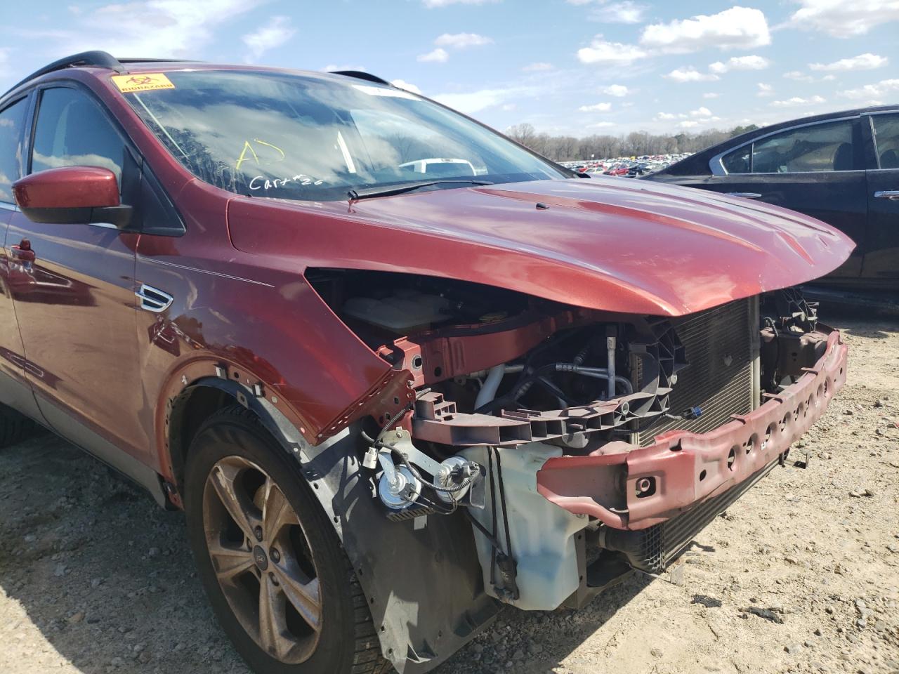 Photo 9 from auction – 2014 FORD ESCAPE with VIN 1FMCU0GX7EUB22712