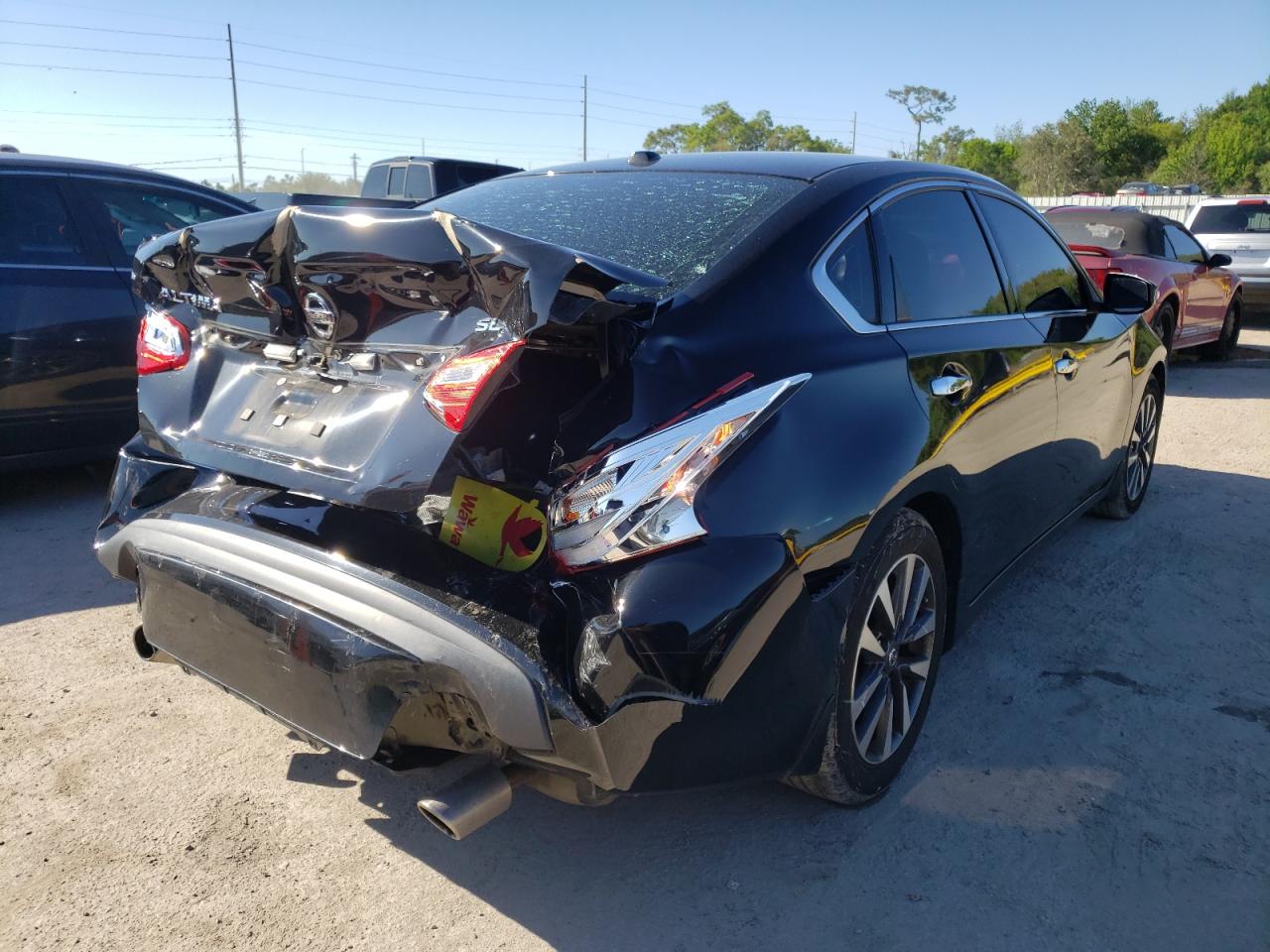 Photo 4 from auction – 2016 NISSAN ALTIMA 2.5 with VIN 1N4AL3AP5GC273118