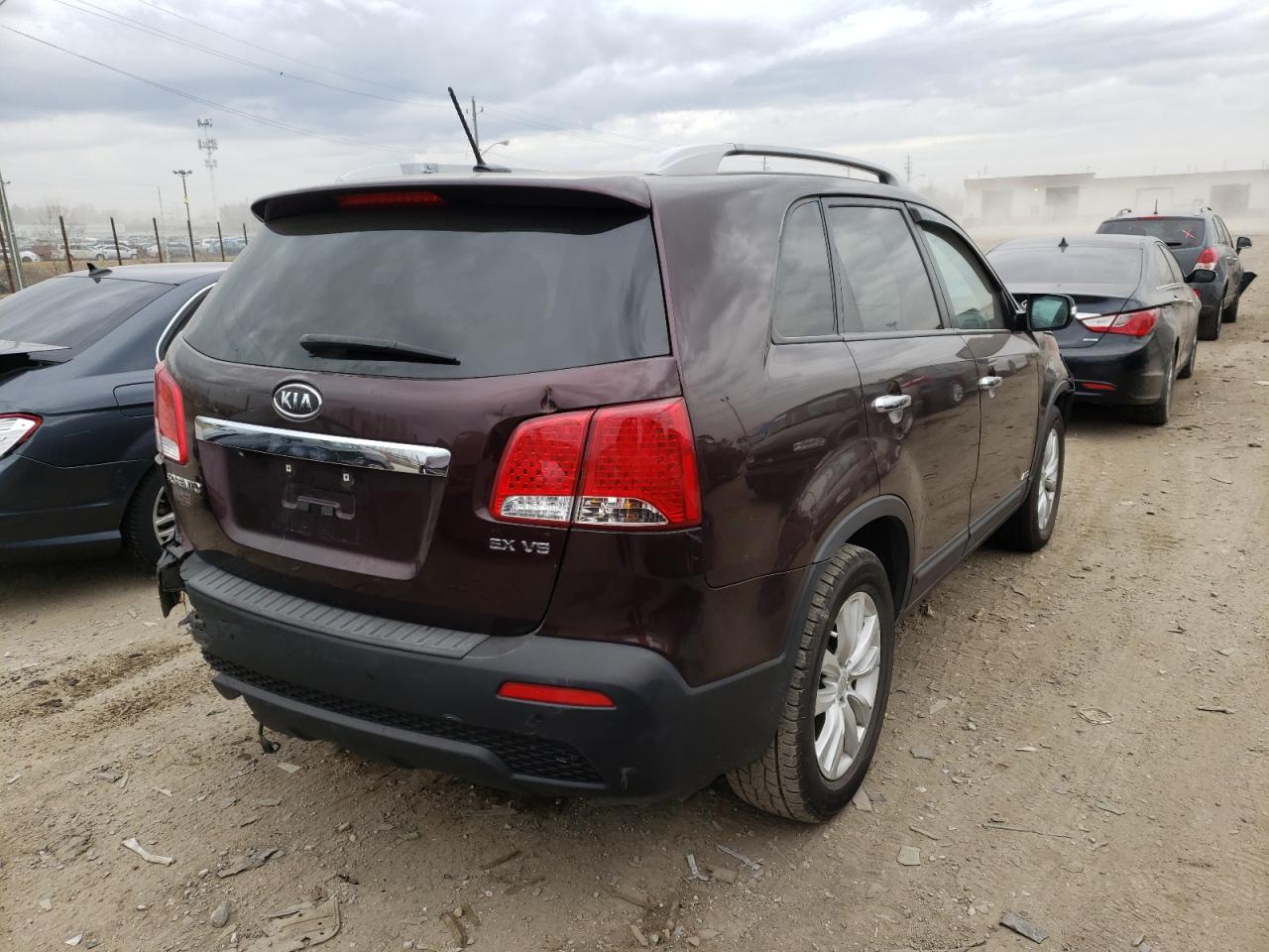 Photo 4 from auction – 2011 KIA SORENTO EX with VIN 5XYKUDA23BG153165