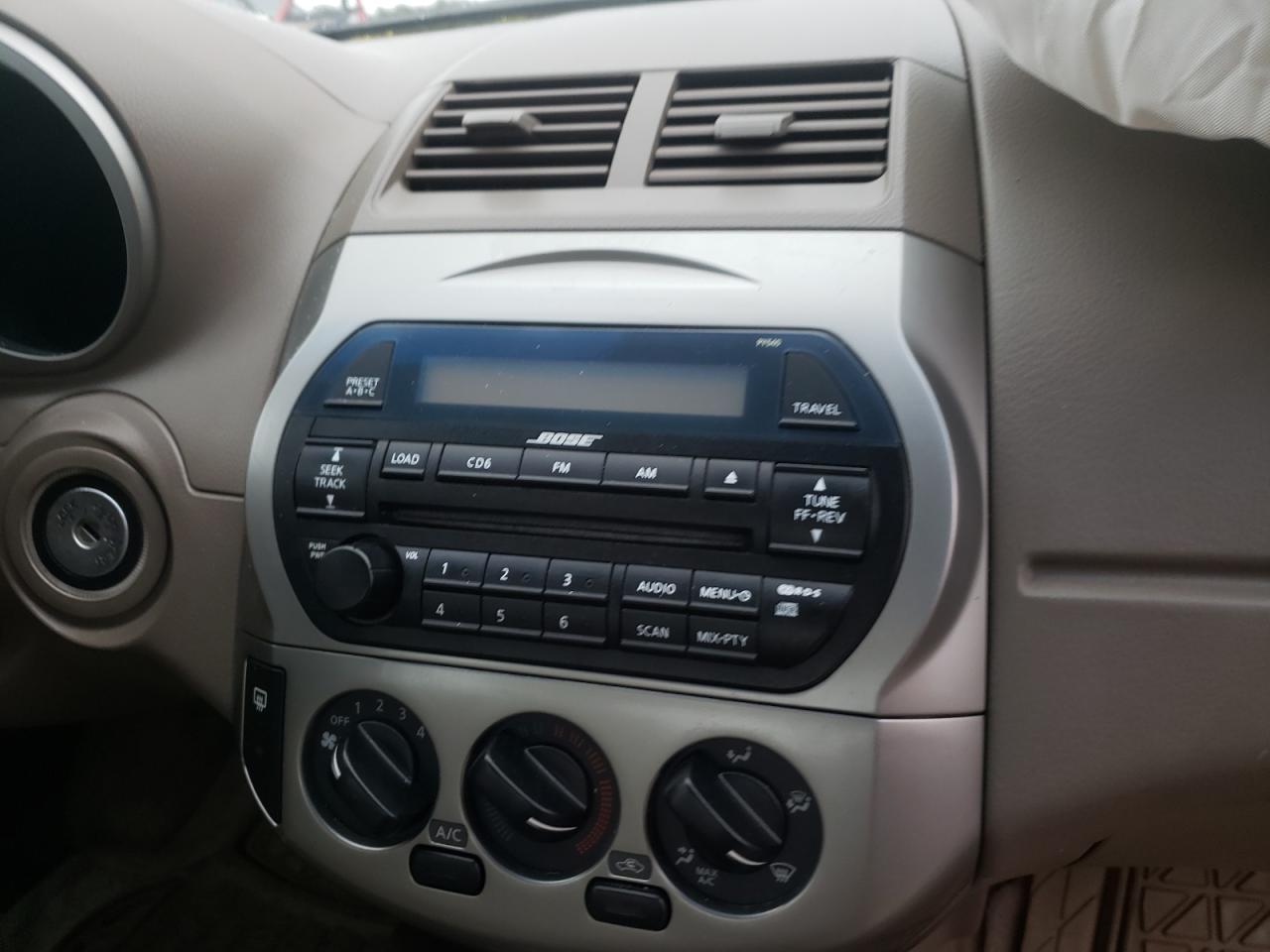 Photo 9 from auction – 2003 NISSAN ALTIMA with VIN 1N4AL11E23C275602