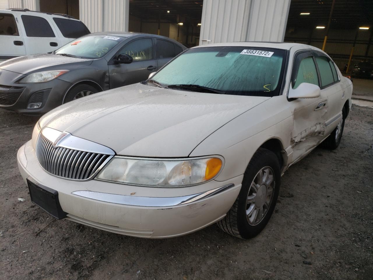 Photo 2 from auction – 2002 LINCOLN CONTINENTA with VIN 1LNHM97V42Y700035
