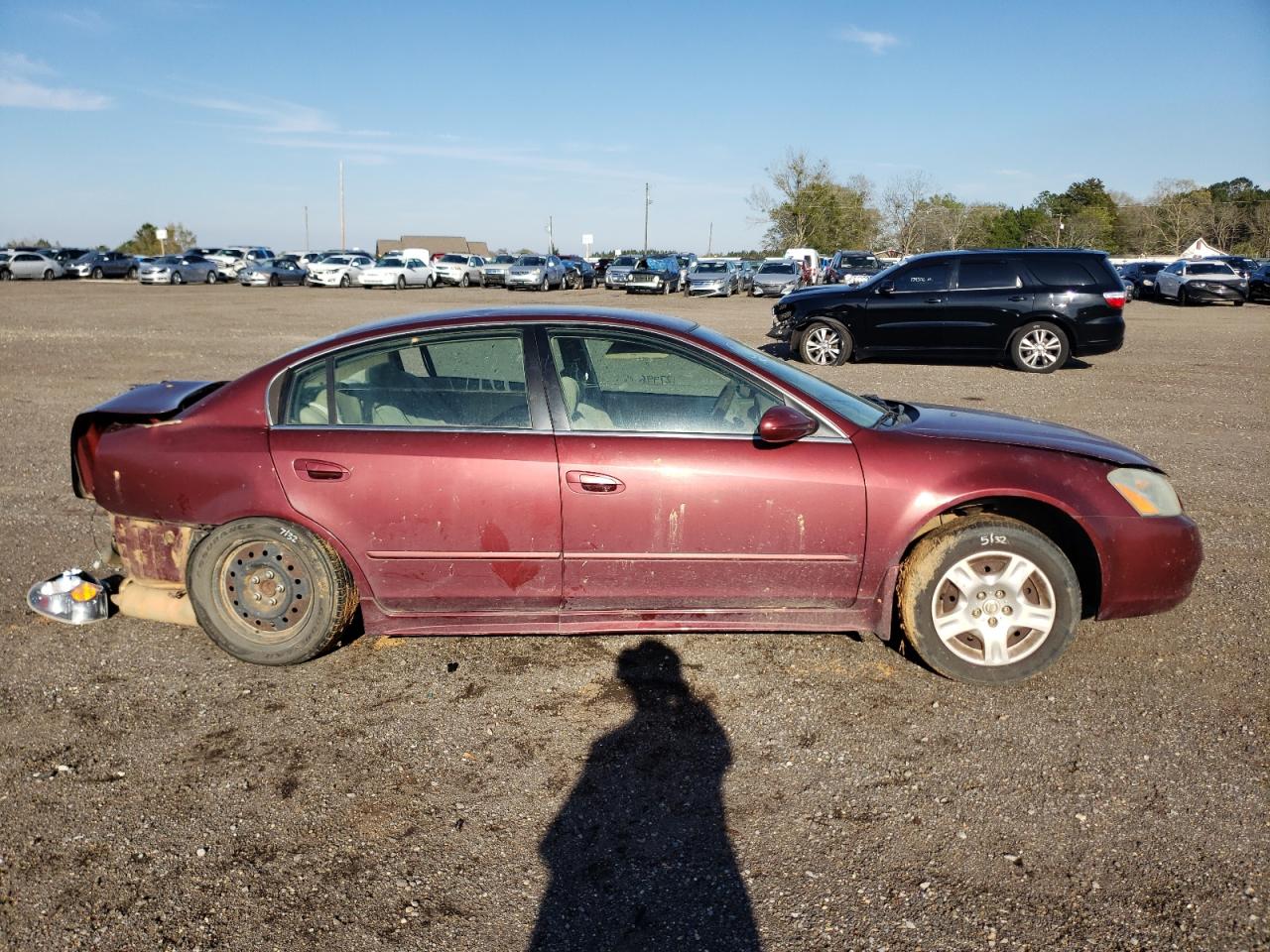 Photo 10 from auction – 2002 NISSAN ALTIMA with VIN 1N4AL11D12C710633