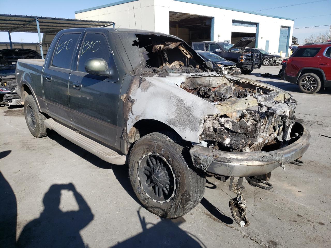 FORD F150 SUPER 2002 with VIN 1FTRW08L62KE36136 - Photo from auction