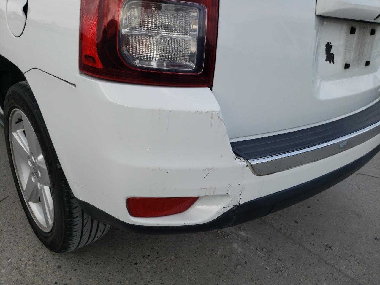 Photo 9 from auction – 2014 JEEP COMPASS LA with VIN 1C4NJCEA3ED680448