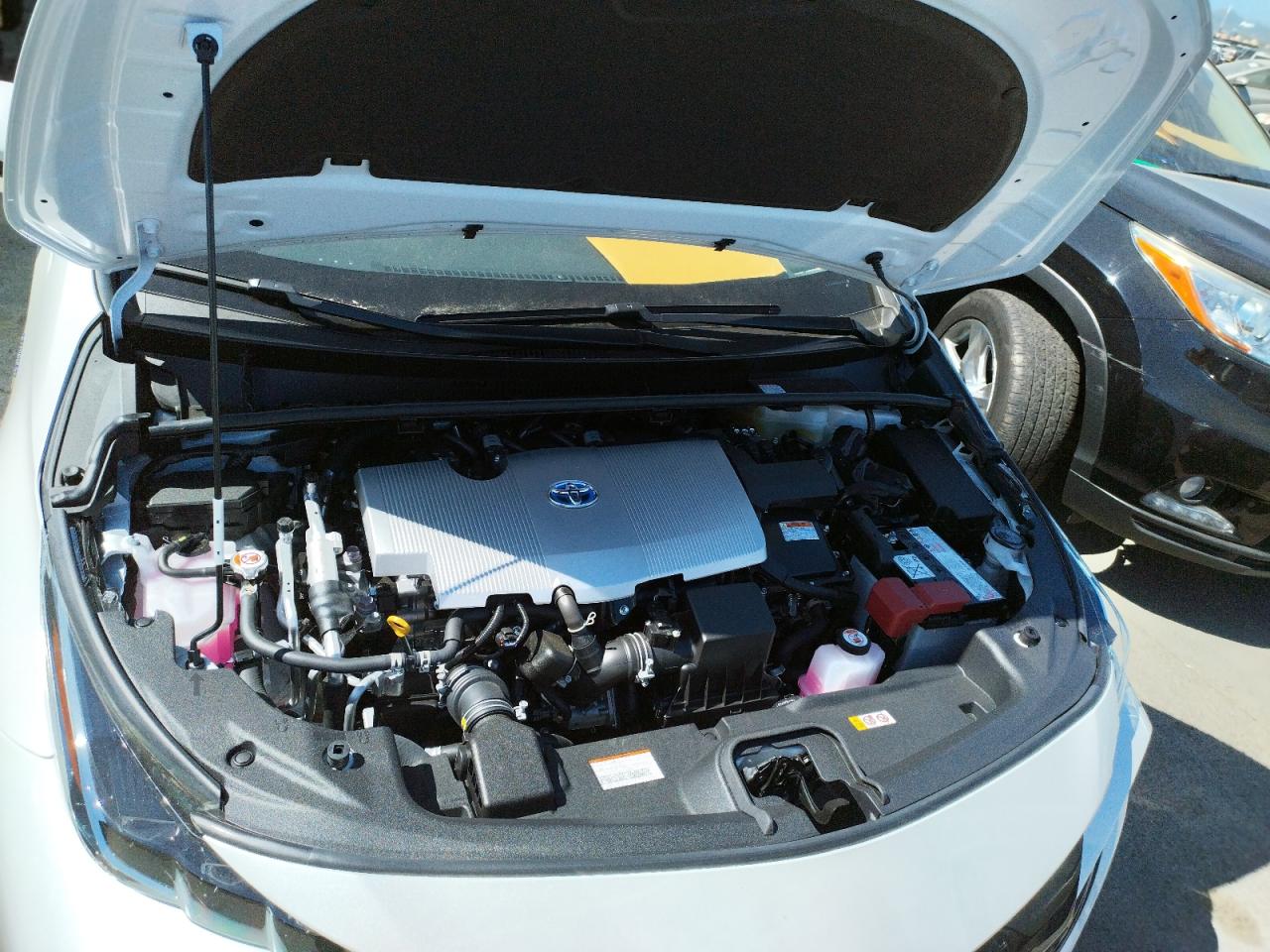Photo 7 from auction – 2022 TOYOTA PRIUS PRIM with VIN JTDKAMFP4N3207868