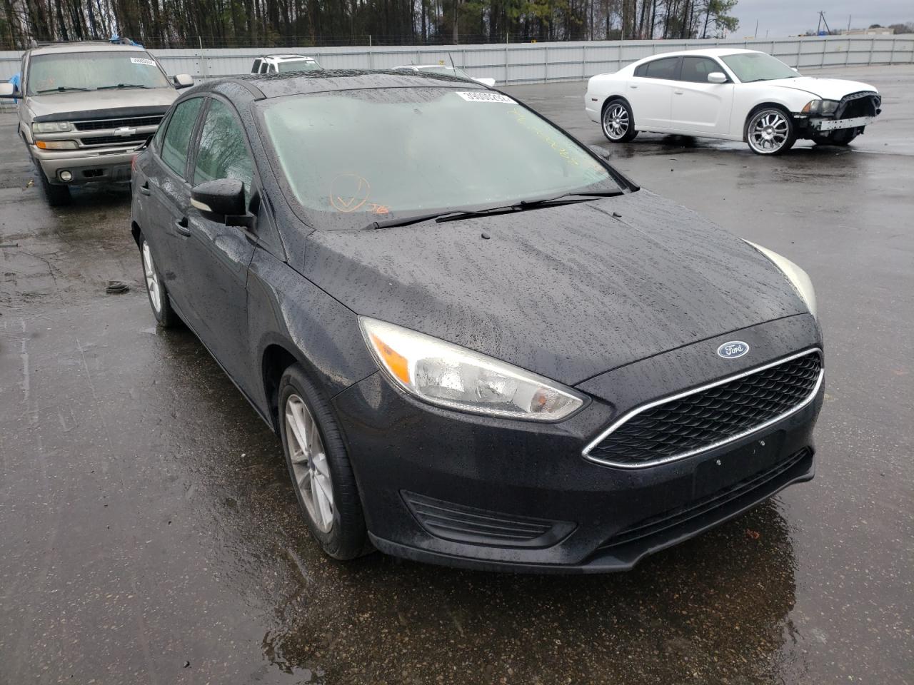FORD FOCUS SE 2015 with VIN 1FADP3F25FL206564 - Photo from auction