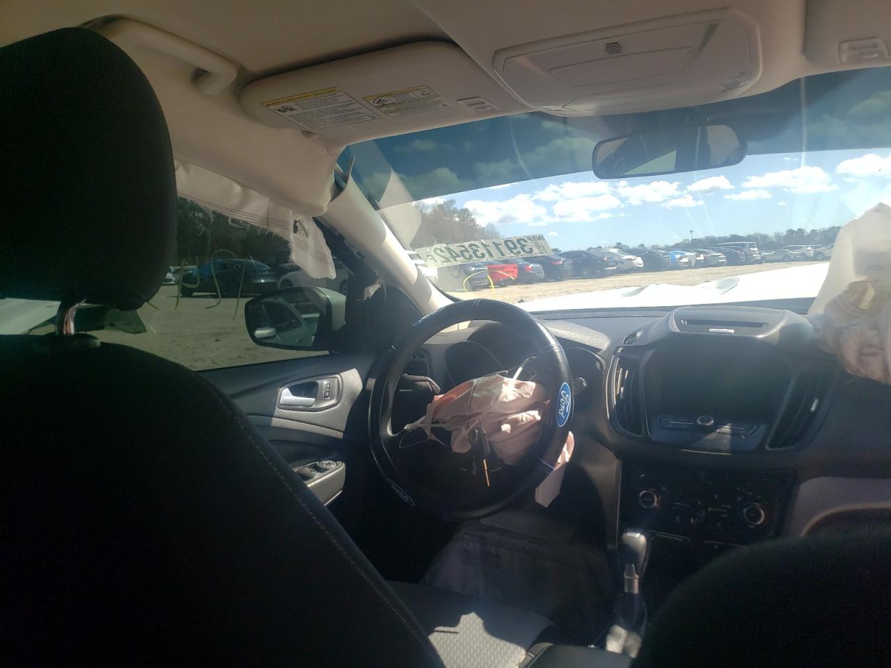 Photo 9 from auction – 2017 FORD ESCAPE SE with VIN 1FMCU9GD7HUC52102