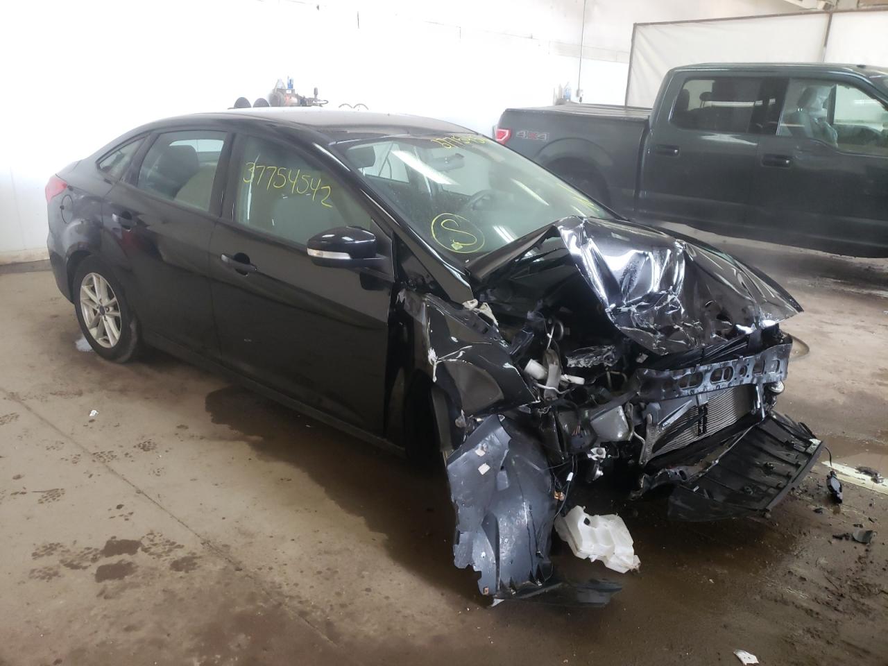 FORD FOCUS SE 2016 with VIN 1FADP3F23GL404237 - Photo from auction