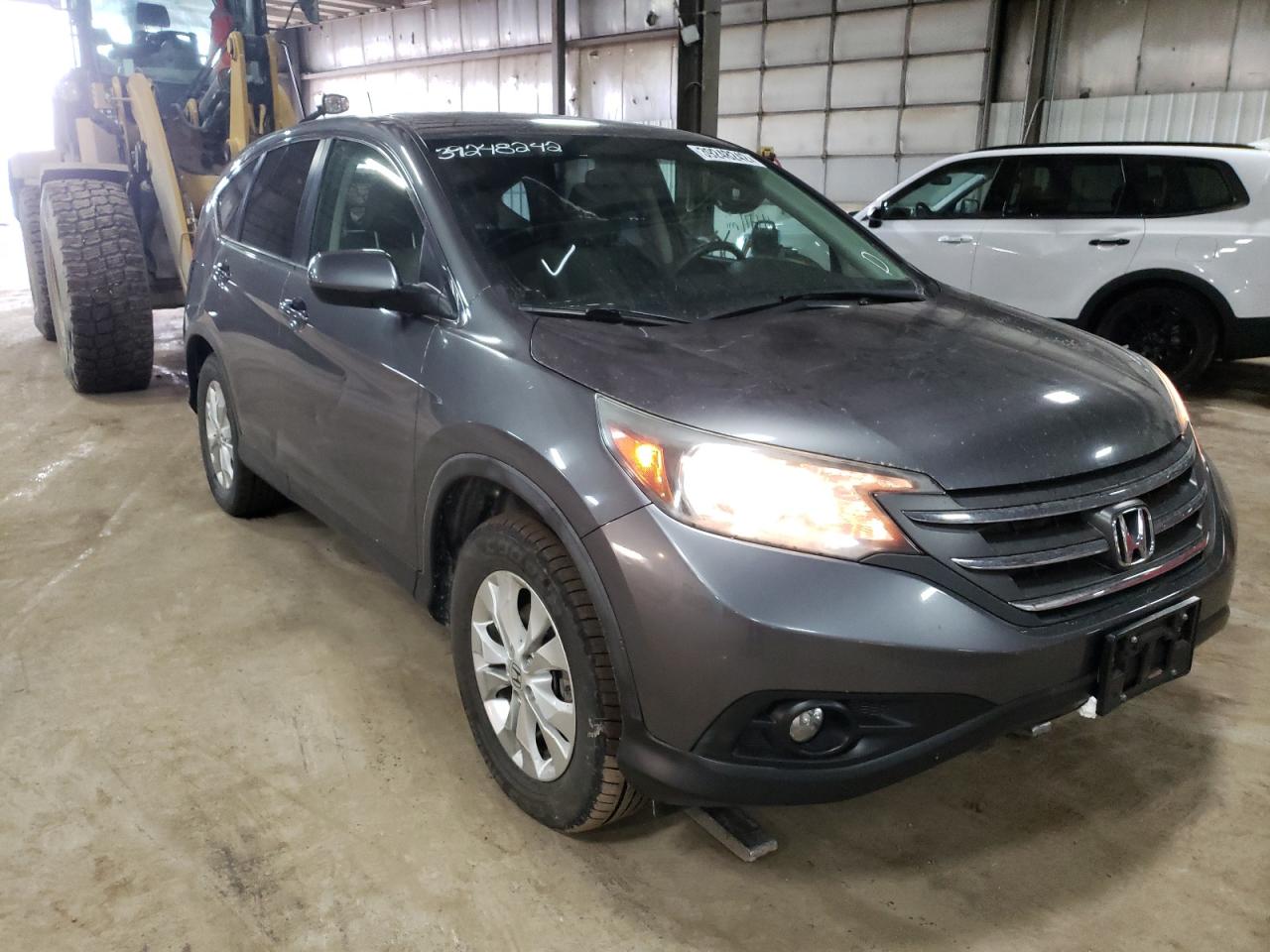 HONDA CR-V EX 2012 with VIN JHLRM4H5XCC000919 - Photo from auction