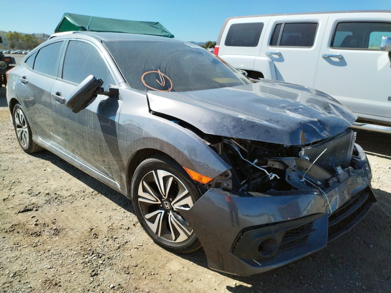 HONDA CIVIC EX 2018 with VIN JHMFC1F30JX030213 - Photo from auction