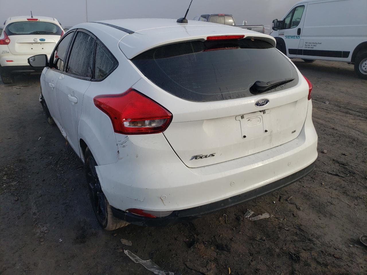 Photo 3 from auction – 2016 FORD FOCUS SE with VIN 1FADP3K25GL332527
