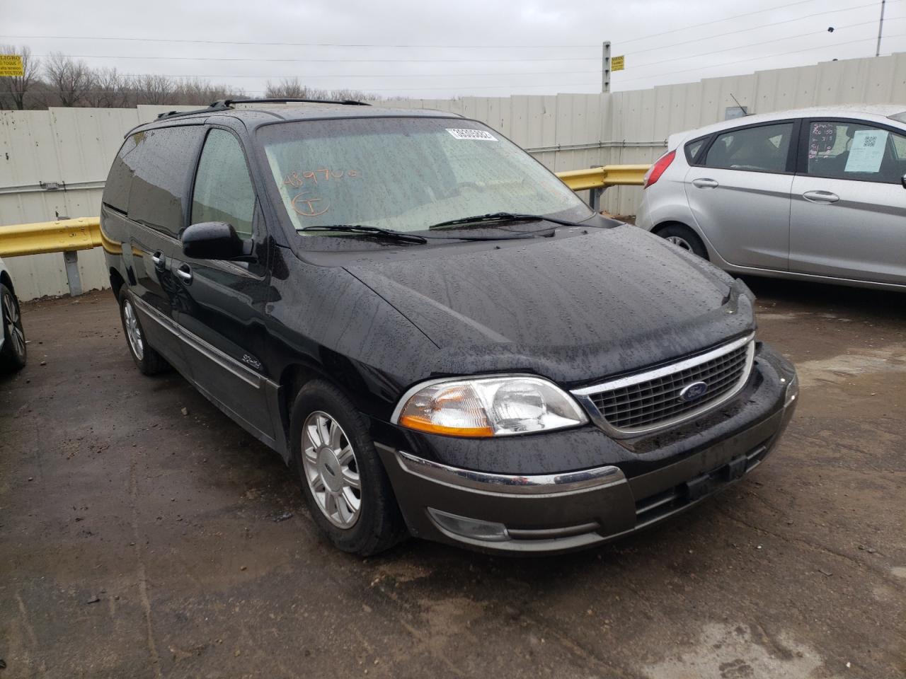 FORD WINDSTAR L 2002 with VIN 2FMDA584X2BA89706 - Photo from auction