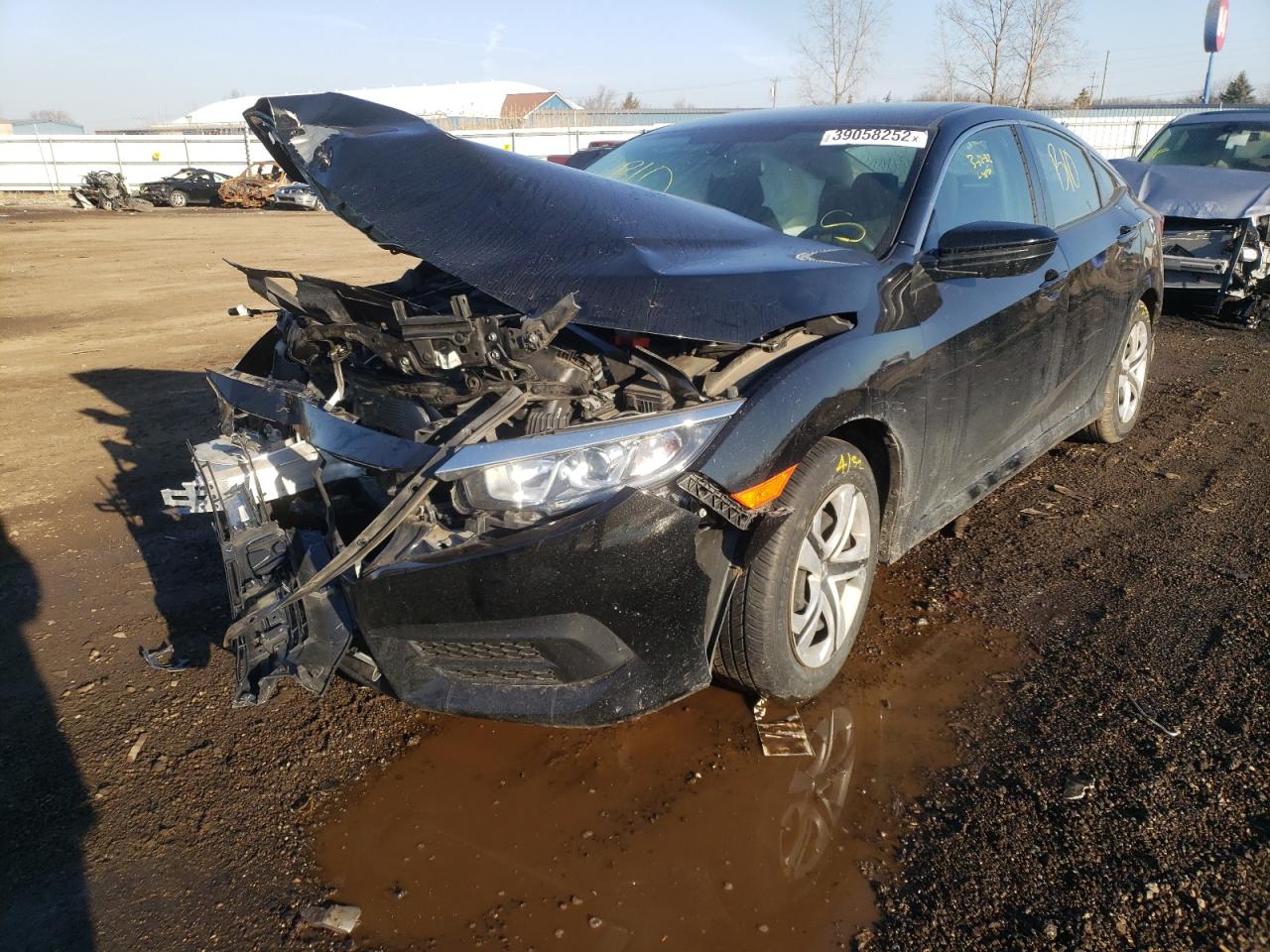 Photo 2 from auction – 2018 HONDA CIVIC LX with VIN 2HGFC2F57JH562539