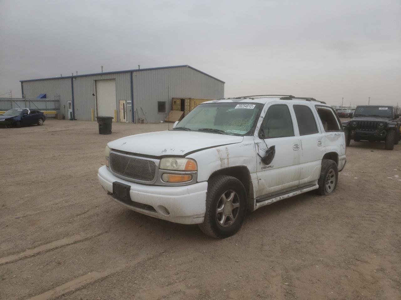 Photo 2 from auction – 2002 GMC YUKON with VIN 1GKEK63U62J152335