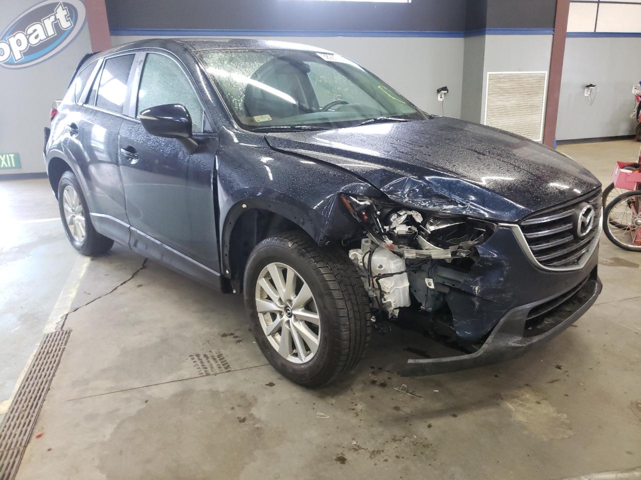 MAZDA CX-5 TOURI 2016 with VIN JM3KE4CY5G0702402 - Photo from auction
