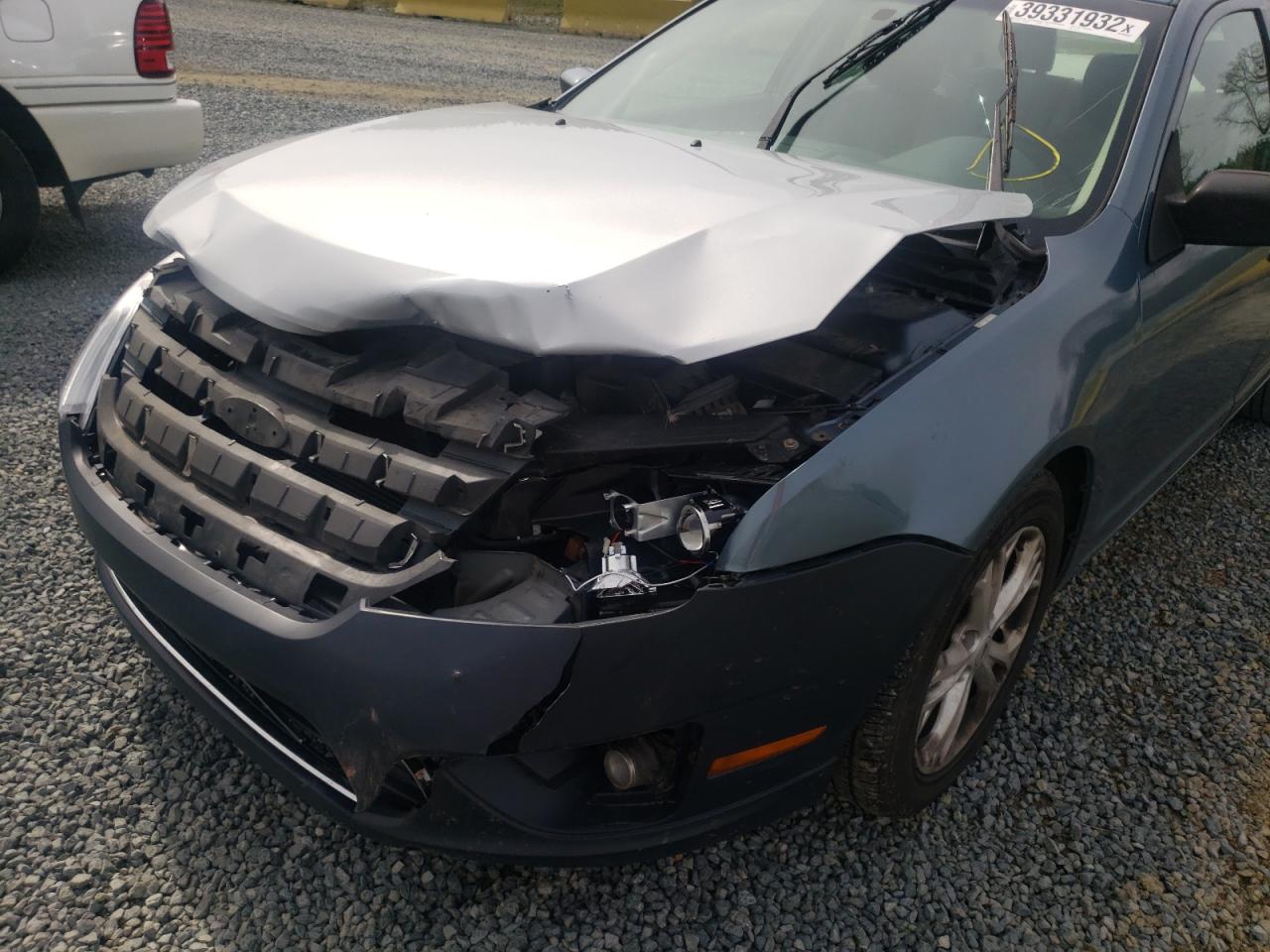Photo 9 from auction – 2012 FORD FUSION SE with VIN 3FAHP0HA5CR213970