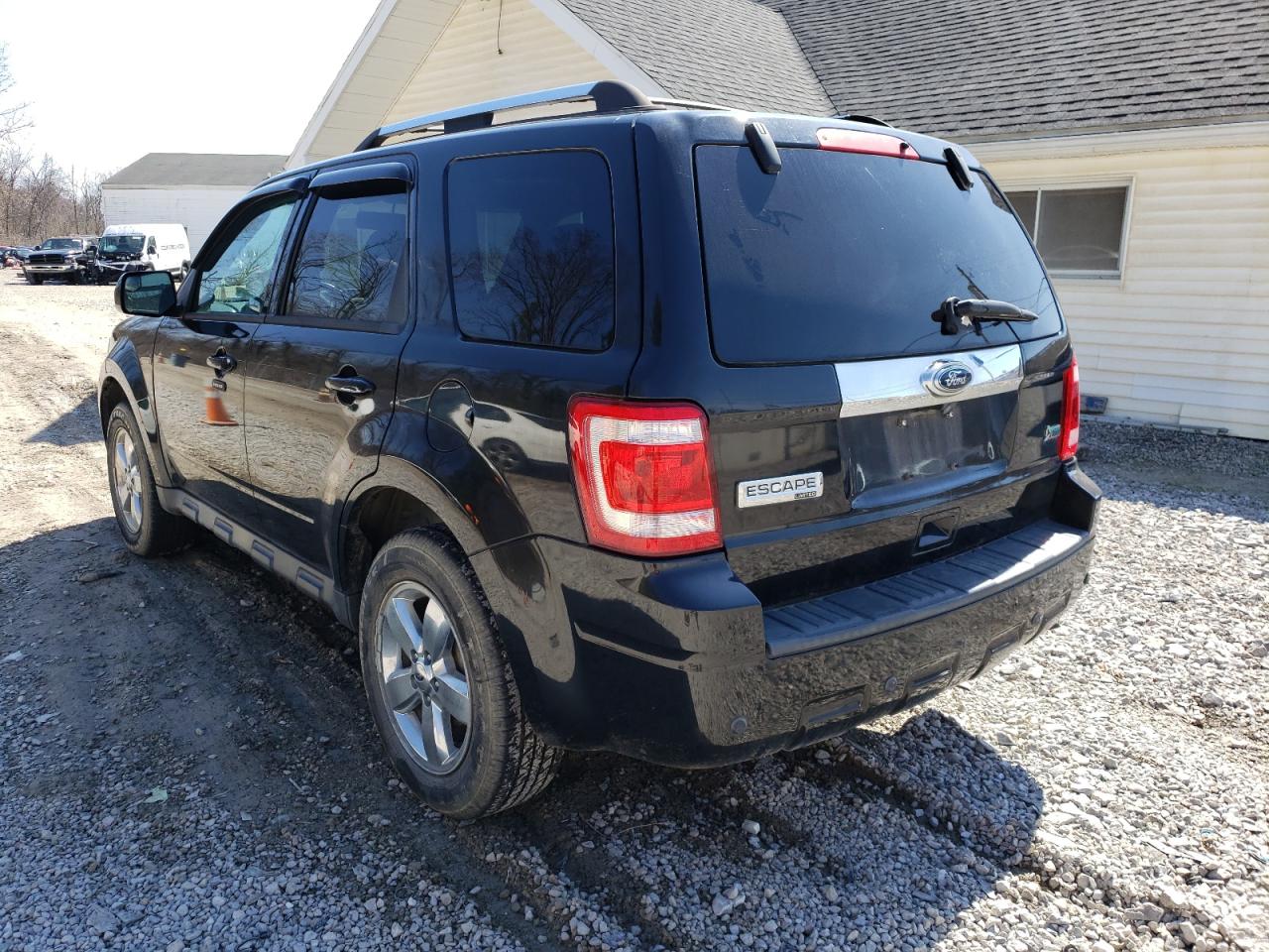Photo 3 from auction – 2011 FORD ESCAPE LIM with VIN 1FMCU9EG8BKA42656
