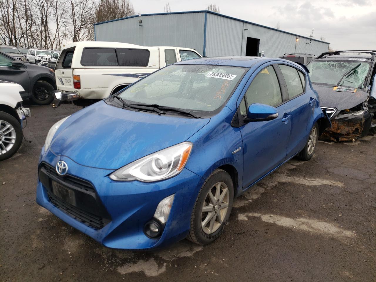 Photo 2 from auction – 2015 TOYOTA PRIUS C with VIN JTDKDTB39F1092489
