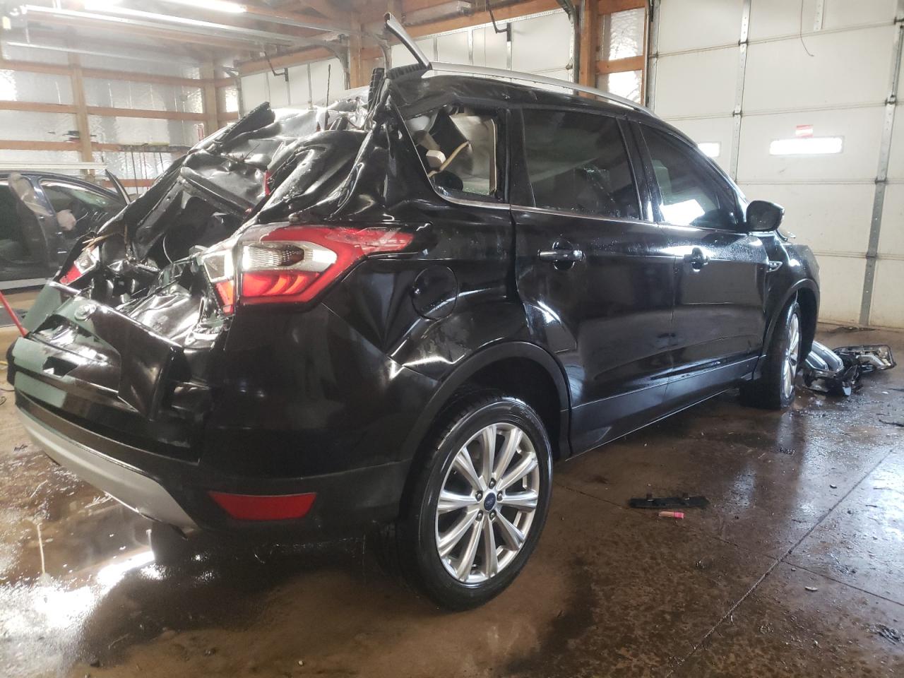 Photo 4 from auction – 2017 FORD ESCAPE TIT with VIN 1FMCU0J96HUB91387
