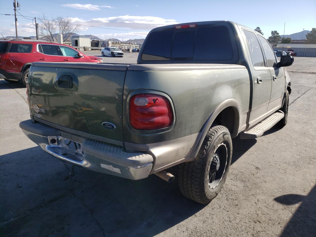 Photo 4 from auction – 2002 FORD F150 SUPER with VIN 1FTRW08L62KE36136