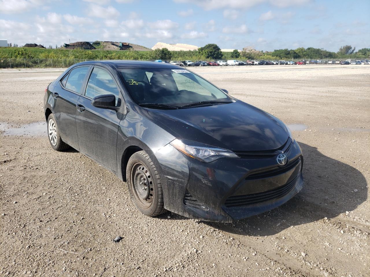 TOYOTA COROLLA L 2017 with VIN 5YFBURHE0HP571488 - Photo from auction