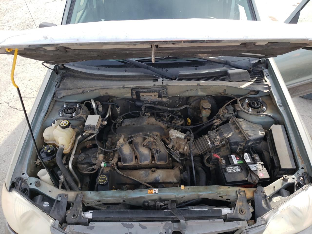 Photo 7 from auction – 2003 MAZDA TRIBUTE LX with VIN 4F2YZ04143KM37410